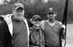 Eric Saperstein (right) & Girlfriend Terri with Roger, our guide for our 2006 boar hunt at Deerfield Plantation, St George, SC
