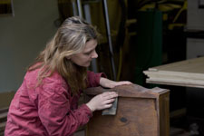 Theresa Tonte - Artisans of the Valley - Radio Cabinet Restoration - Working on Drawer (Photo by Henry Schweber)