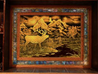 Custom hand carved glass wildlife scene by Randy Mardrus - in a bar by Eric Saperstein of Artisans of the Valley