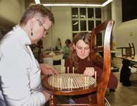 Sandra Holland & Theresa Tonte - Caning Class in Princeton, NJ working on a caned chair.