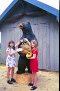 Artisans of the Valley feature Chainsaw Carving by Bob Eigenrauch - Two Grils with a Black Bear