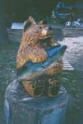 Artisans of the Valley feature Chainsaw Carving by Bob Eigenrauch - A sitting bear and his salmon