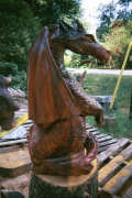 Artisans of the Valley feature Chainsaw Carving by Bob Eigenrauch - Dragon Side Profile Stained Left