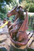 Artisans of the Valley feature Chainsaw Carving by Bob Eigenrauch - Dragon Side Profile Stained Right