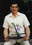 Stanley Saperstein Posed with Flower Carving - 1997